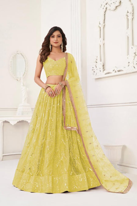 Aastha Fashion Lemon Yellow Butterfly Net Tone To Tone Cotton Thread Work With Sequence Work Embroidery Wedding Wear Lehenga Choli