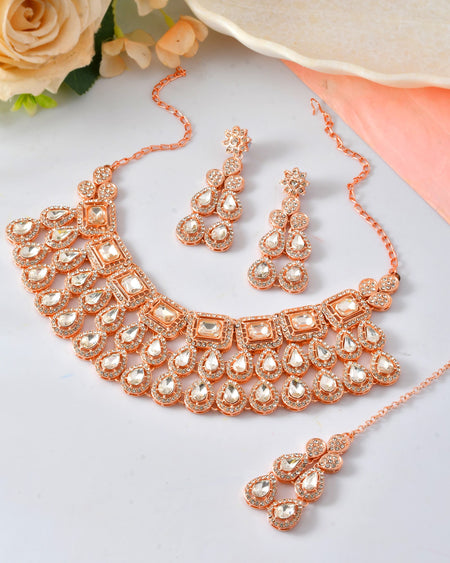 VOJ Rose Gold-Polished CZ Studded Jewellery Set With Maang Tikka