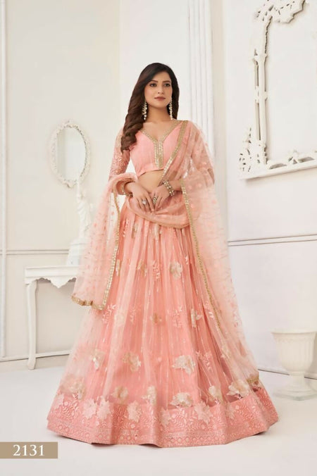 Aastha Fashion Peach Butterfly Net Tone To Tone Thread Work And Sequence Work Embroidery Wedding Wear Lehenga Choli