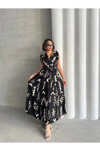 Pimu V-Neck Maxi Dress with Black Graphic Print