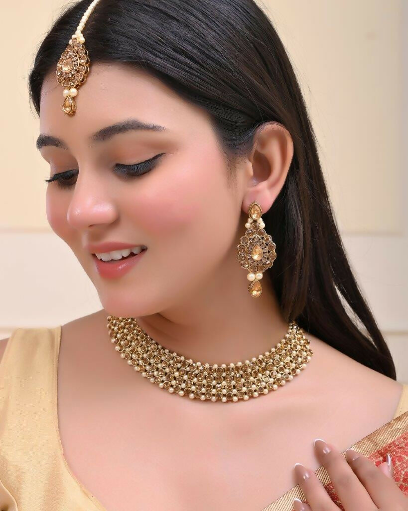 VOJ Gold-Polished Stone Studded Choker Necklace With Earrings And Manag Tikka Set
