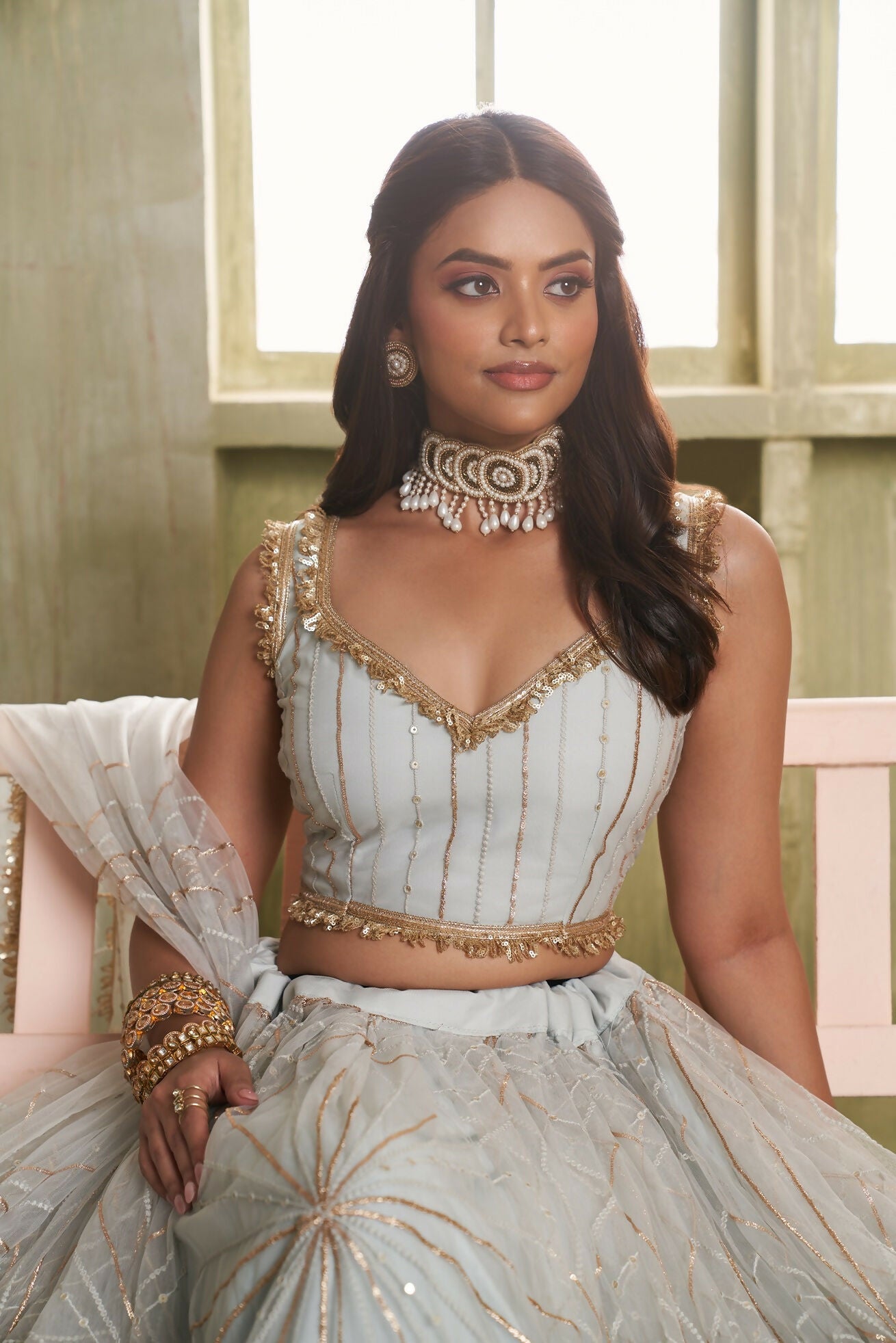 Eilara Light Gray Sequins Net Function Wear Lehenga Choli Set