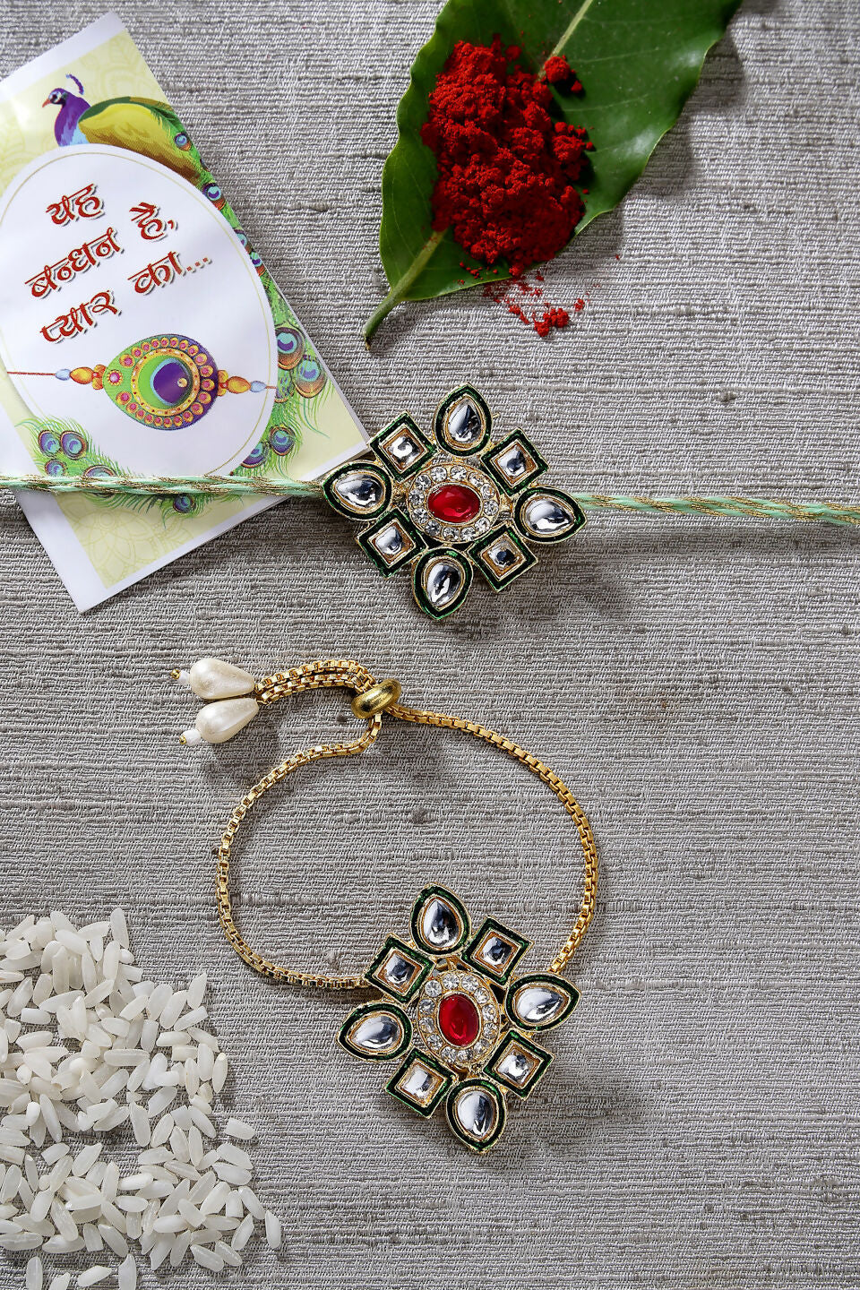 NVR Women & Men Set of 2 Gold Kundan-Studded Handcrafted Wraparound Rakhi Set With Roli Chawal - Distacart