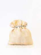 NR By Nidhi Rathi Cream-Coloured & Gold-Toned Embellished Potli Clutch - Distacart