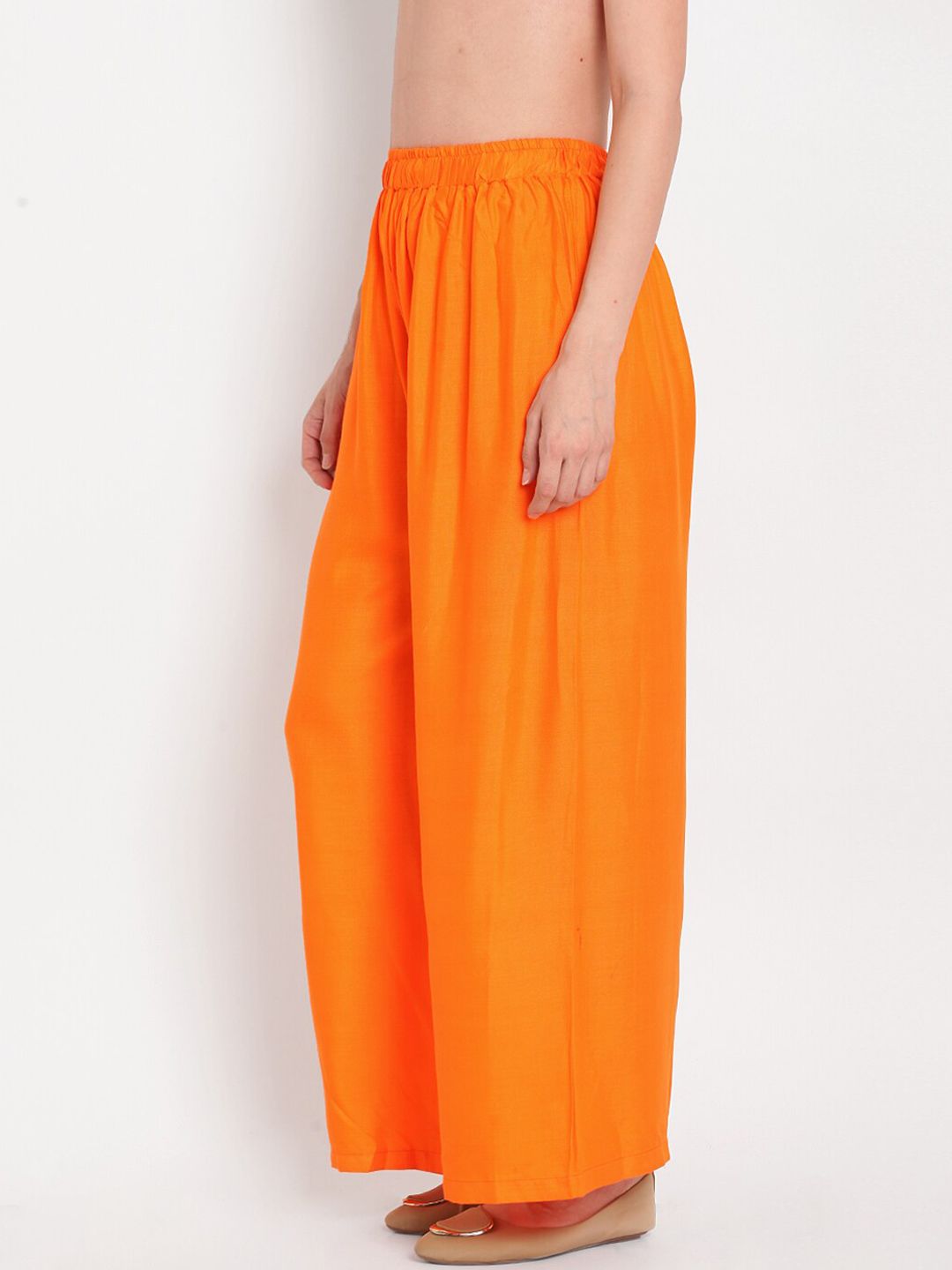 TAG 7 Women Orange Solid Flared Palazzos