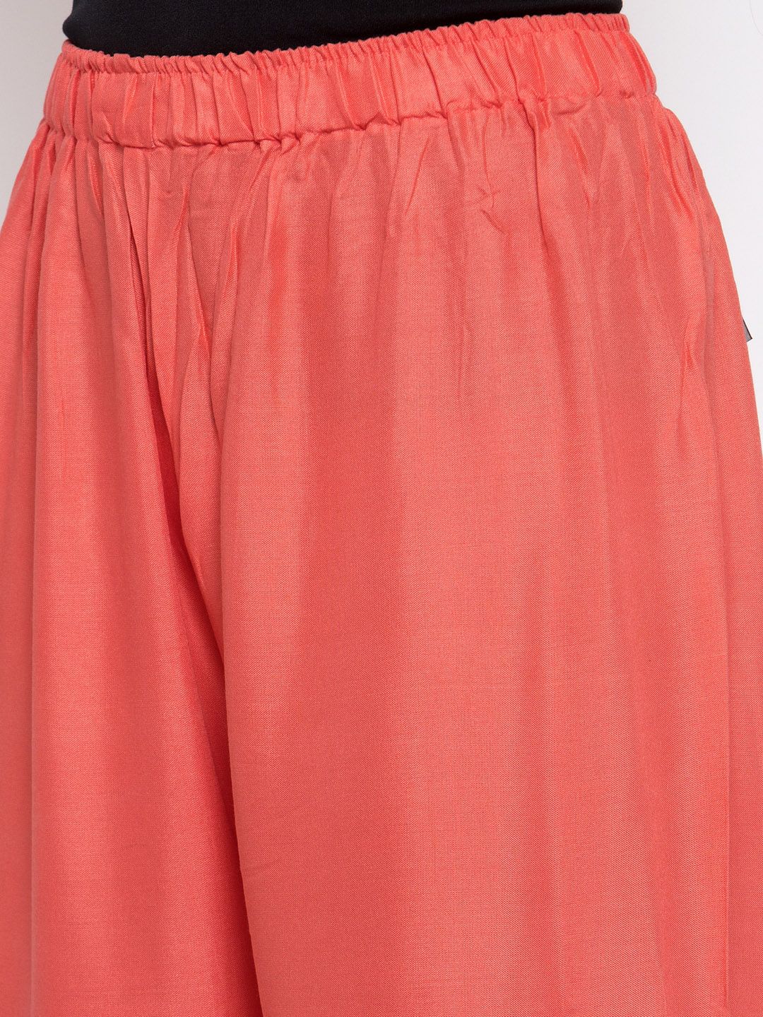 TAG 7 Women Peach-Coloured Solid Flared Palazzos