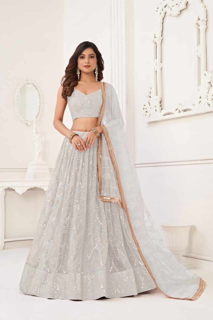 Eilara Glamorous Off White Net With Sequins And Thread Embroidery Real Mirror Work Lehenga Choli For Wedding