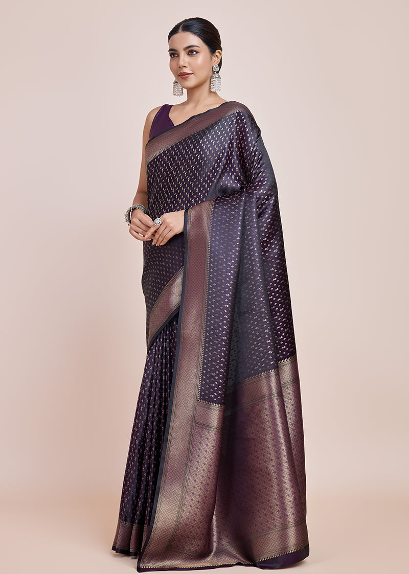 Monjolika Fashion Glamour And Tradition With This Zari Woven Darl Purple Color Banarasi Satin Silk Saree