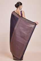 Monjolika Fashion Glamour And Tradition With This Zari Woven Darl Purple Color Banarasi Satin Silk Saree