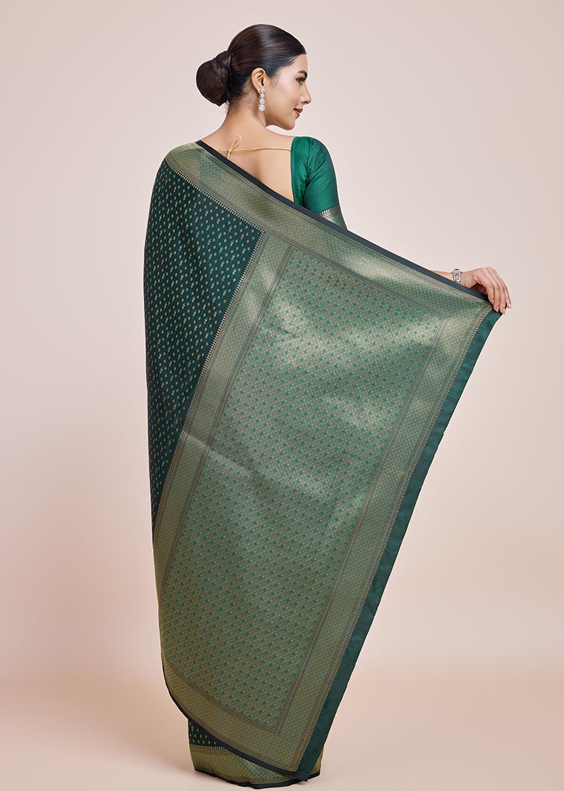 Monjolika Fashion Glamour And Tradition With This Zari Woven Dark Green Color Banarasi Satin Silk Saree