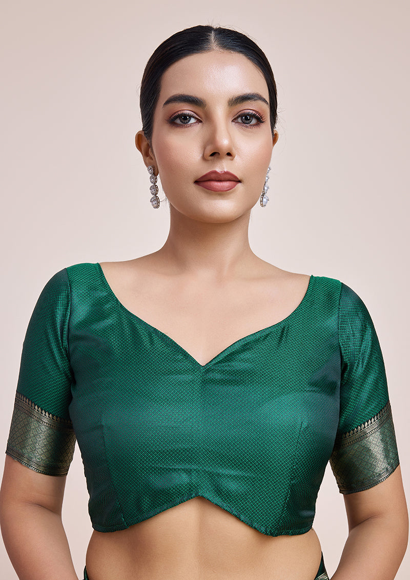 Monjolika Fashion Glamour And Tradition With This Zari Woven Dark Green Color Banarasi Satin Silk Saree