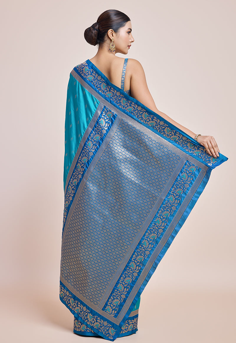 Monjolika Fashion Sky Blue Banarasi Silk In Satin Is Classy Embellished With Golden Zari Work Saree