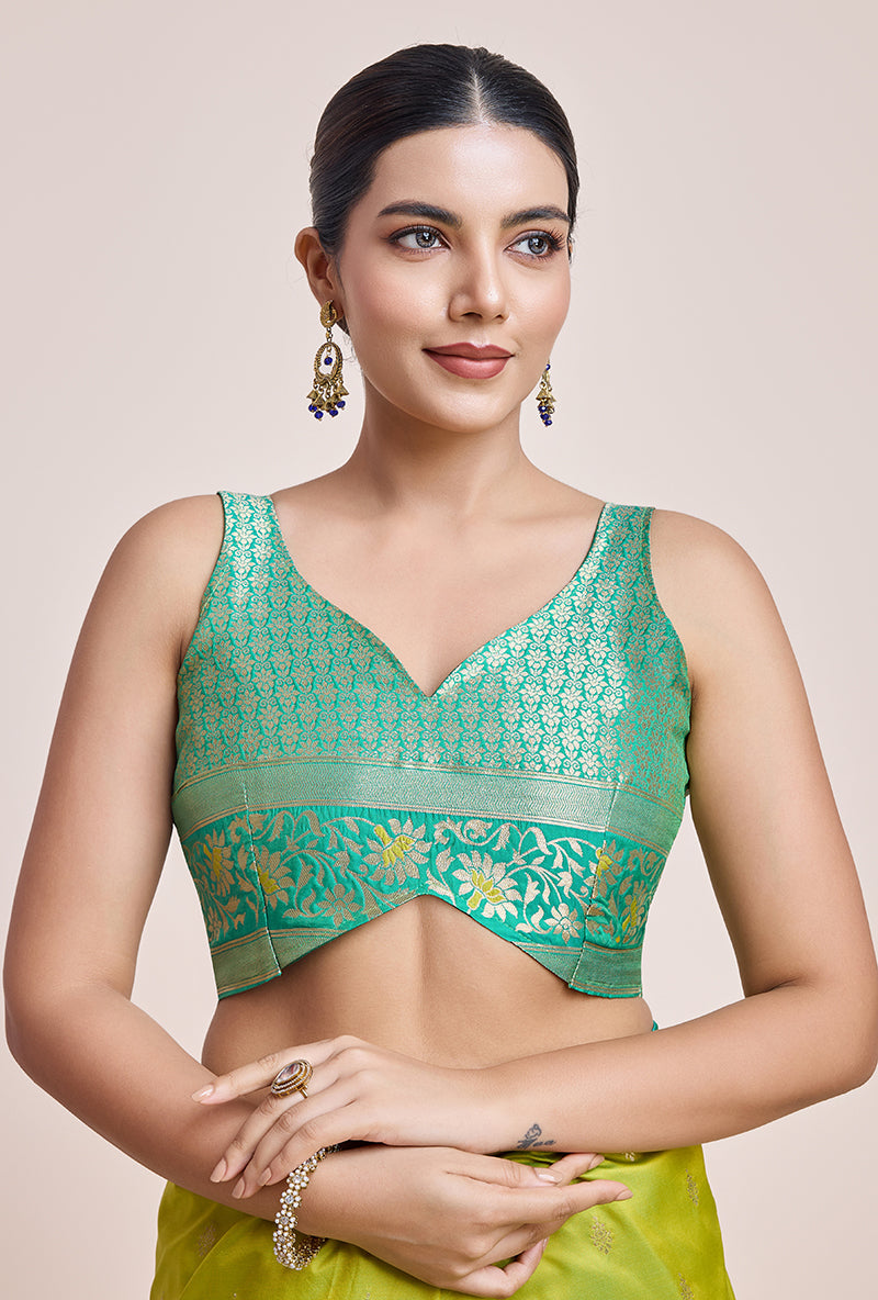 Monjolika Fashion Parrot Green Banarasi Silk In Satin Is Classy Embellished With Golden Zari Work Saree