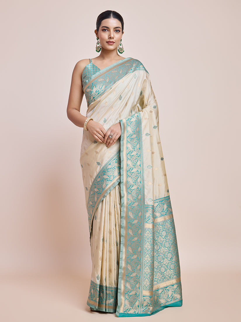 Monjolika Fashion Exquisite Designs With This Cream Banarasi Satin Silk Saree