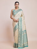 Monjolika Fashion Exquisite Designs With This Cream Banarasi Satin Silk Saree