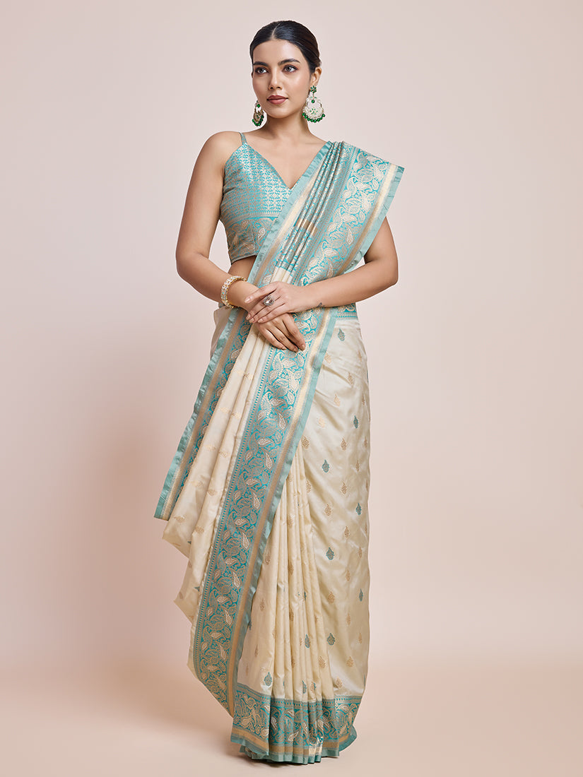 Monjolika Fashion Exquisite Designs With This Cream Banarasi Satin Silk Saree
