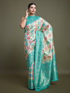 Monjolika Fashion Glamour And Tradition With This Zari Woven Turquoise And Cream Banarasi Silk Saree