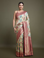 Monjolika Fashion Elegant Maroon And Cream Banarasi Silk SareeWith Intricate Zari Work