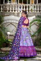 Lorenvalley Lavender Tussar Silk Pichwai With Patola Print And Zari Weaving Border Lehenga Choli with Dupatta