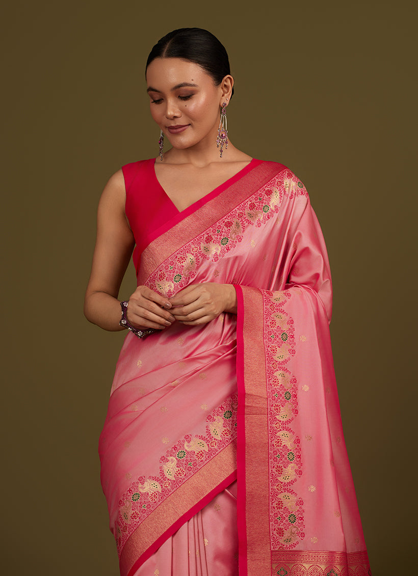 Monjolika Fashion Light Pink Banarasi Silk Blend SareeIn Classic Paisley & Rich Zari Pallu Comes With Unstitched Blouse