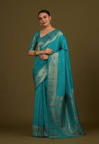 Monjolika Fashion Elegant Cyan Banarasi Silk Blend SareeBrocade Motifs & Zari Woven Splendor - Distacart