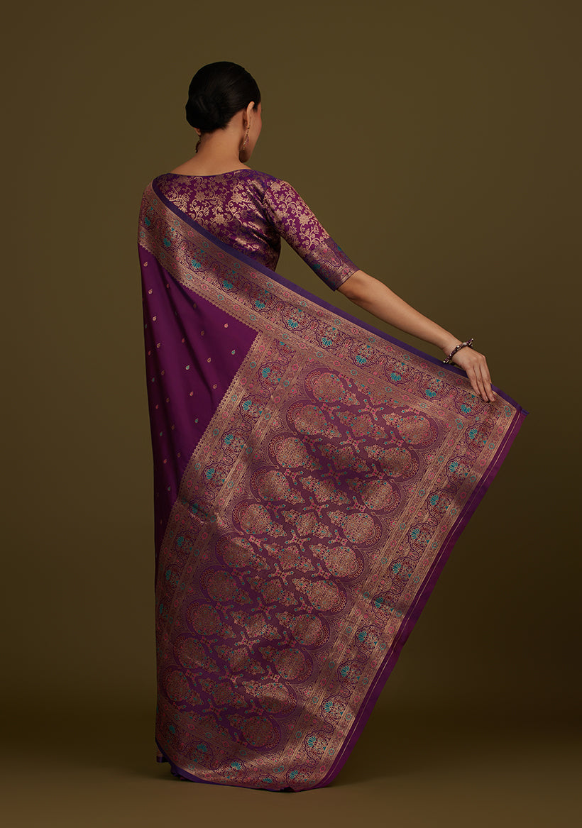 Monjolika Fashion Elegant Dark Purple Banarasi Silk Blend SareeBrocade Motifs & Zari Woven Splendor