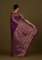 Monjolika Fashion Elegant Dark Purple Banarasi Silk Blend SareeBrocade Motifs & Zari Woven Splendor