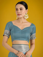 Monjolika Fashion Dusty Cyan Weaving Banarasi Satin Silk Trendy Saree For Festival