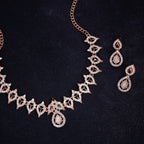 Tehzeeb Creations Shimmering Rose Gold Polished Ad Studded Necklace Jewellery Set With Matching Earrings For Women And Girls