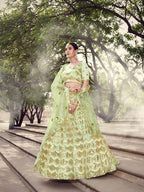 Myra Pista Green Soft Net Heavy Embroidered Lehenga