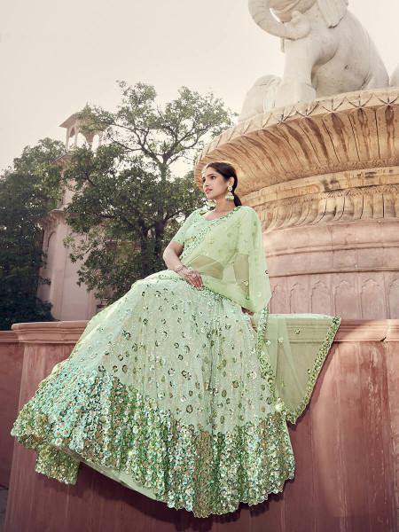 Myra Pista Green Soft Net Heavy Embroidered Lehenga