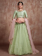 Myra Pista Green Soft Net Heavy Embroidered Lehenga