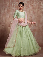 Myra Pista Green Soft Net Heavy Embroidered Lehenga