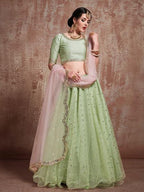 Myra Pista Green Soft Net Heavy Embroidered Lehenga