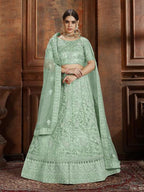 Myra Pista Green Soft Net Heavy Embroidered Lehenga