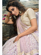 Myra Cream and Lilac Net Embroidered Lehenga Choli