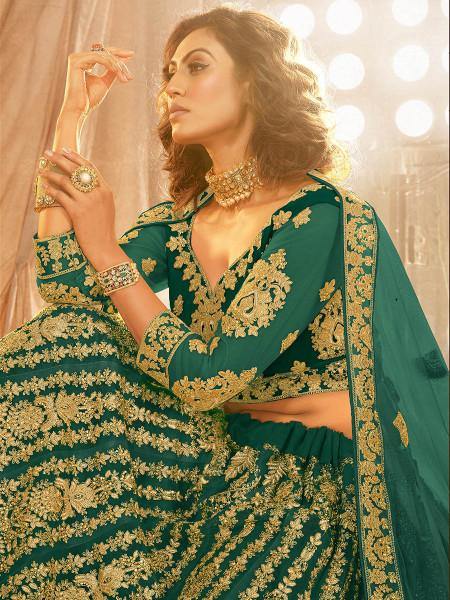 Myra Rama Green Heavy Embroidered Net Lehenga