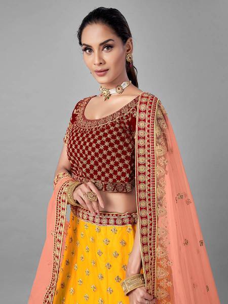 Musturd Heavy Embroidered Soft Net and Velvet Bridal Lehenga