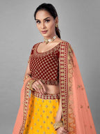 Musturd Heavy Embroidered Soft Net and Velvet Bridal Lehenga