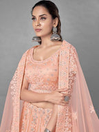 Myra Peach Heavy Embroidered Soft Net bridal Lehenga