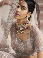 Beautiful Mauve Heavy Embroidered Soft Net Bridal Lehenga