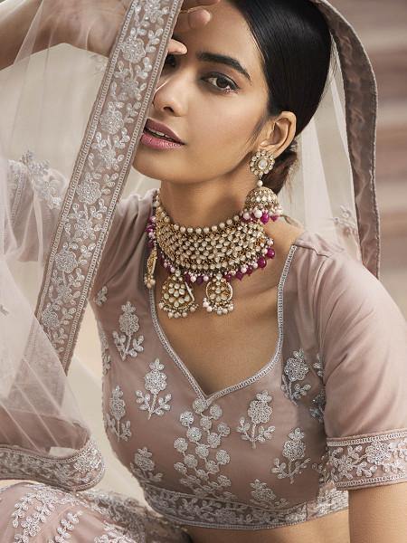 Beautiful Mauve Heavy Embroidered Soft Net Bridal Lehenga