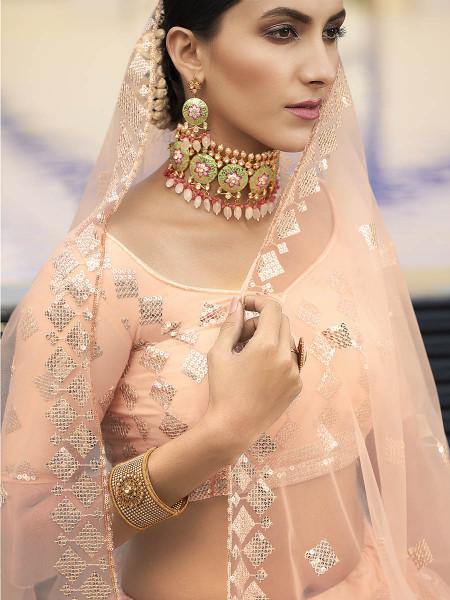 Myra Peach Heavy Embroidered Soft Net Bridal Lehenga