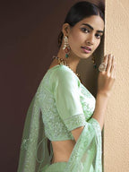 Myra Green Heavy Embroidered Soft Net bridal Lehenga