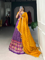 Lorenvalley Purple Tussar Silk Bandhej and Patola Print with Foil Work Lehenga Choli with Dupatta