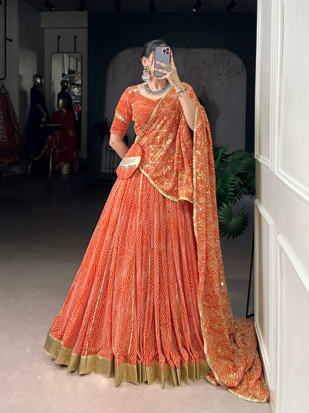 Lorenvalley Fashion Orange Georgette Bandhej Print and Embossed Design Lace with Gota Patti Touch Up Lehenga Choli with Dupatta