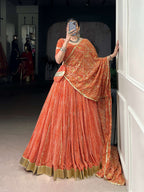 Lorenvalley Fashion Orange Georgette Bandhej Print and Embossed Design Lace with Gota Patti Touch Up Lehenga Choli with Dupatta