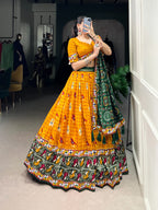 Lorenvalley Mustard Tussar Silk Patola Print with Gamthi Work Lace and Foil Work Lehenga Choli with Dupatta