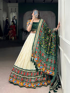 Lorenvalley Fashion Offwhite Tasar Silk Patola Print With Foil Work And Real Mirror Gamthi Work With Lace Touch Up Lehenga Choli with Dupatta