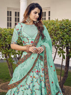 Myra Pista Green Silk Heavy Embroidered Lehenga